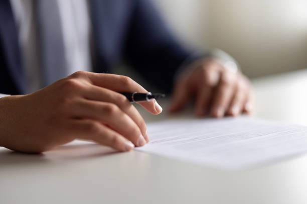 Person writing Note